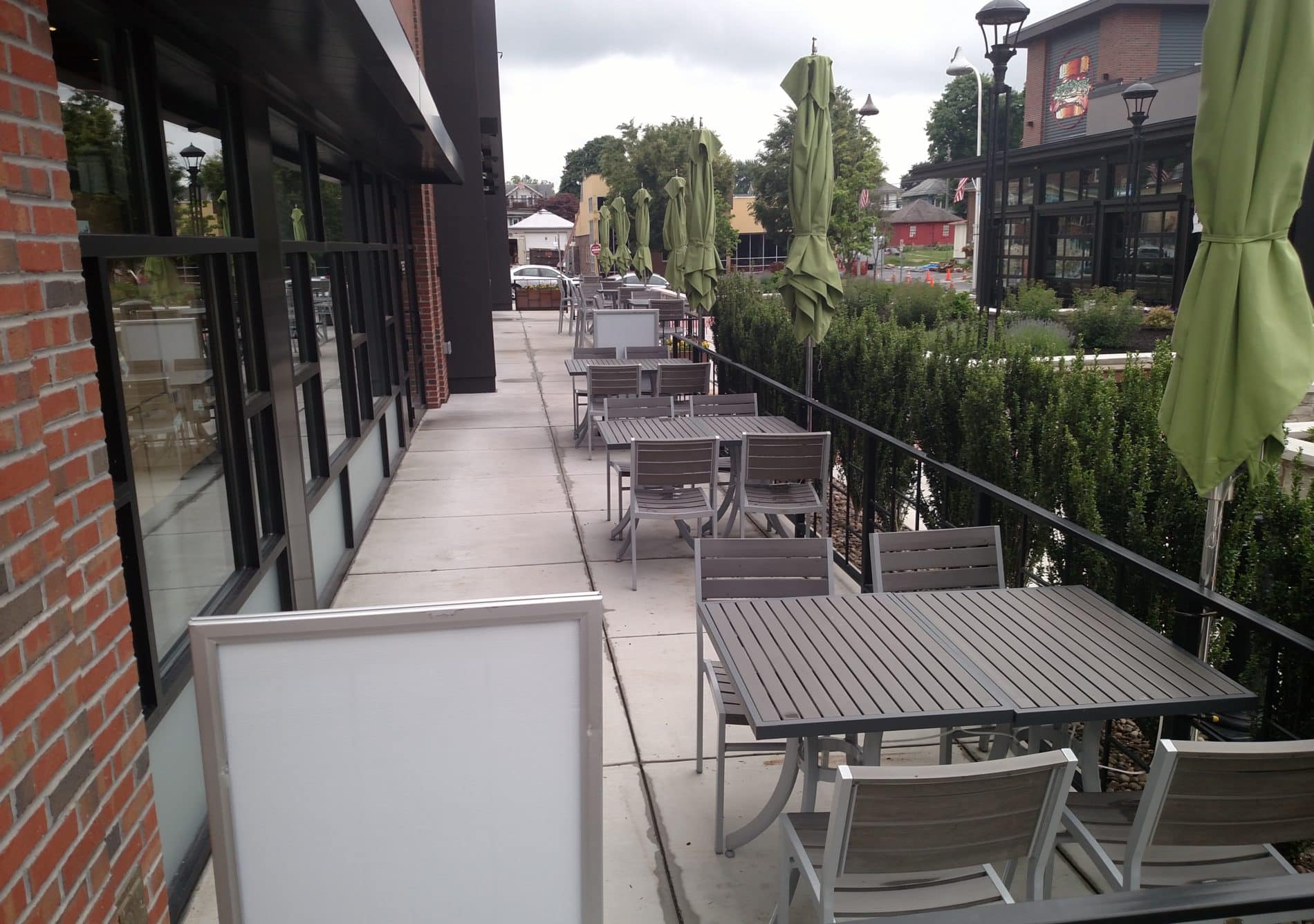 outdoor dining area showing tables with umbrellas