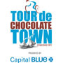 Blue and brown banner for Tour de Chocolate Town